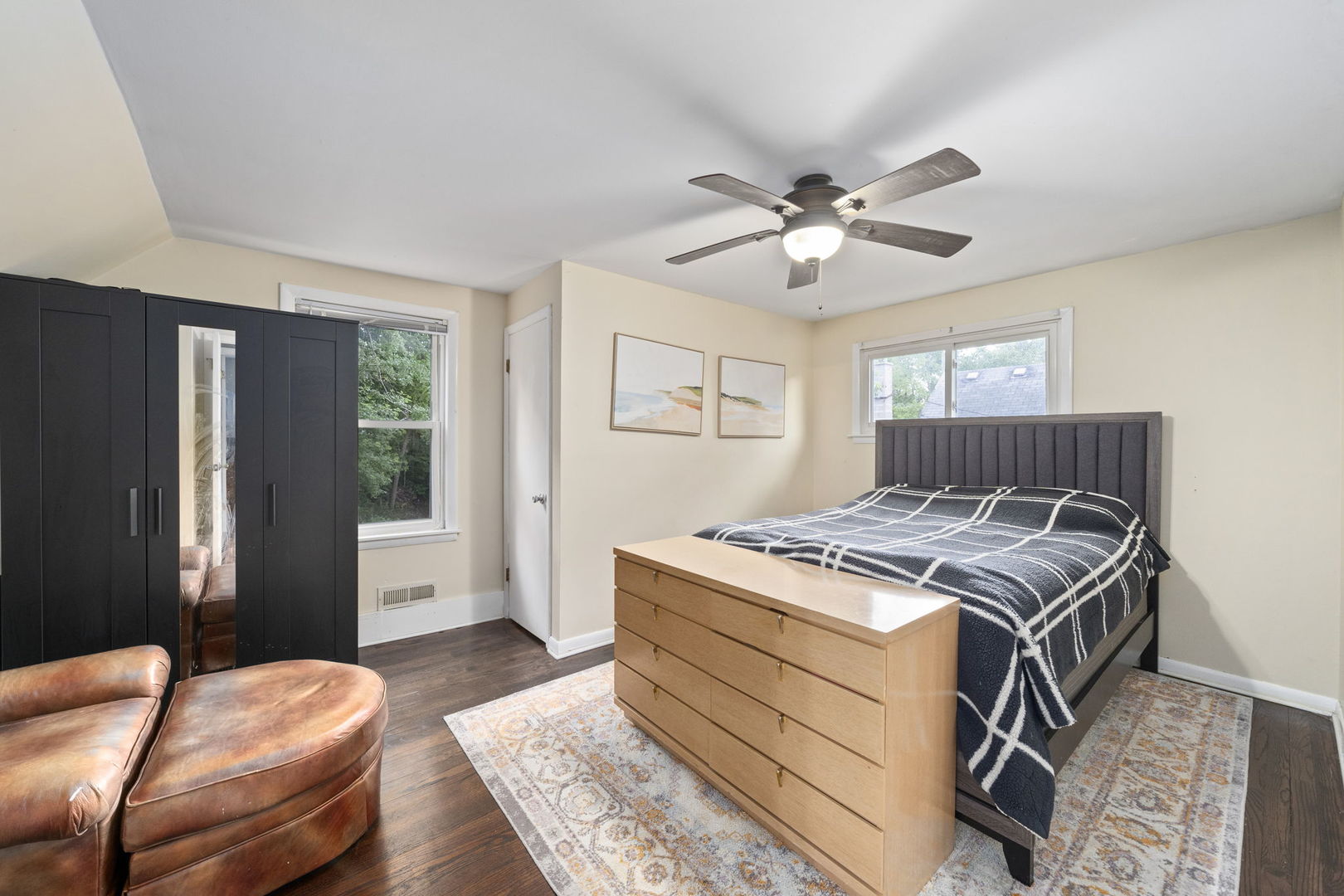 532 Willard Avenue Elgin, IL 60120 - Photo 12 of 19 a bedroom with bed and a chandelier