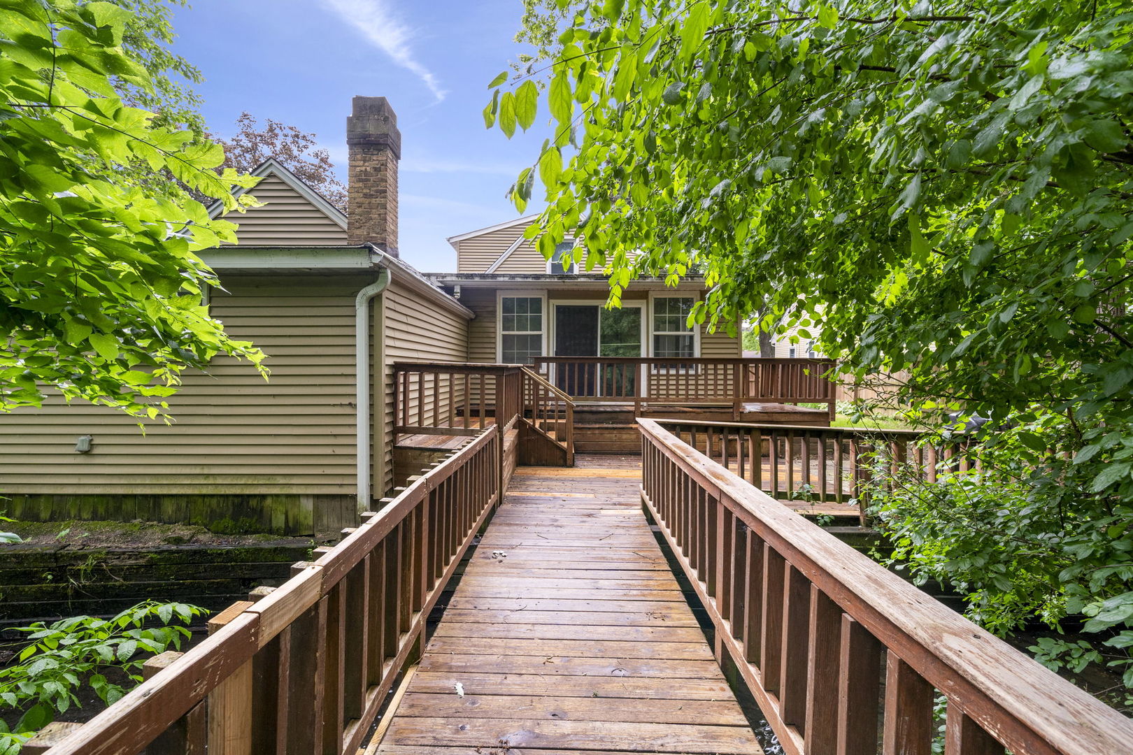 532 Willard Avenue Elgin, IL 60120 - Photo 15 of 19 a view of a house with large trees