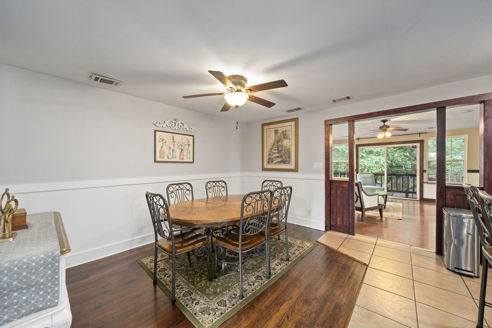 532 Willard Avenue Elgin, IL 60120 - Photo 6 of 19 a dining room with furniture a chandelier and wooden floor