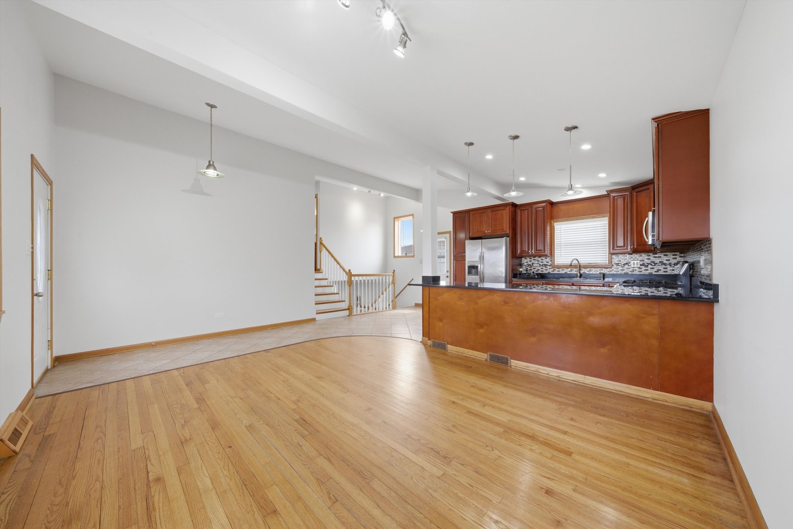 10725 Rutherford Avenue Worth, IL 60482 - Photo 12 of 44 a view of kitchen and kitchen with wooden floor