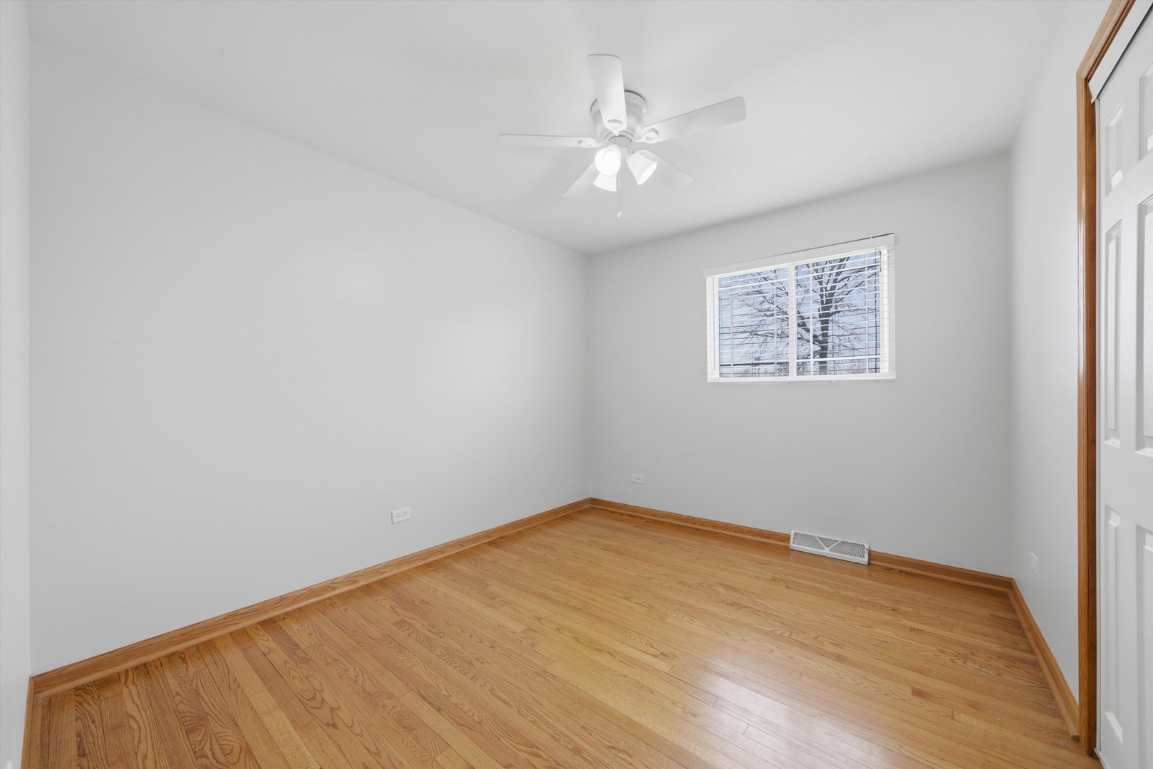 10725 Rutherford Avenue Worth, IL 60482 - Photo 20 of 44 wooden floor in an empty room