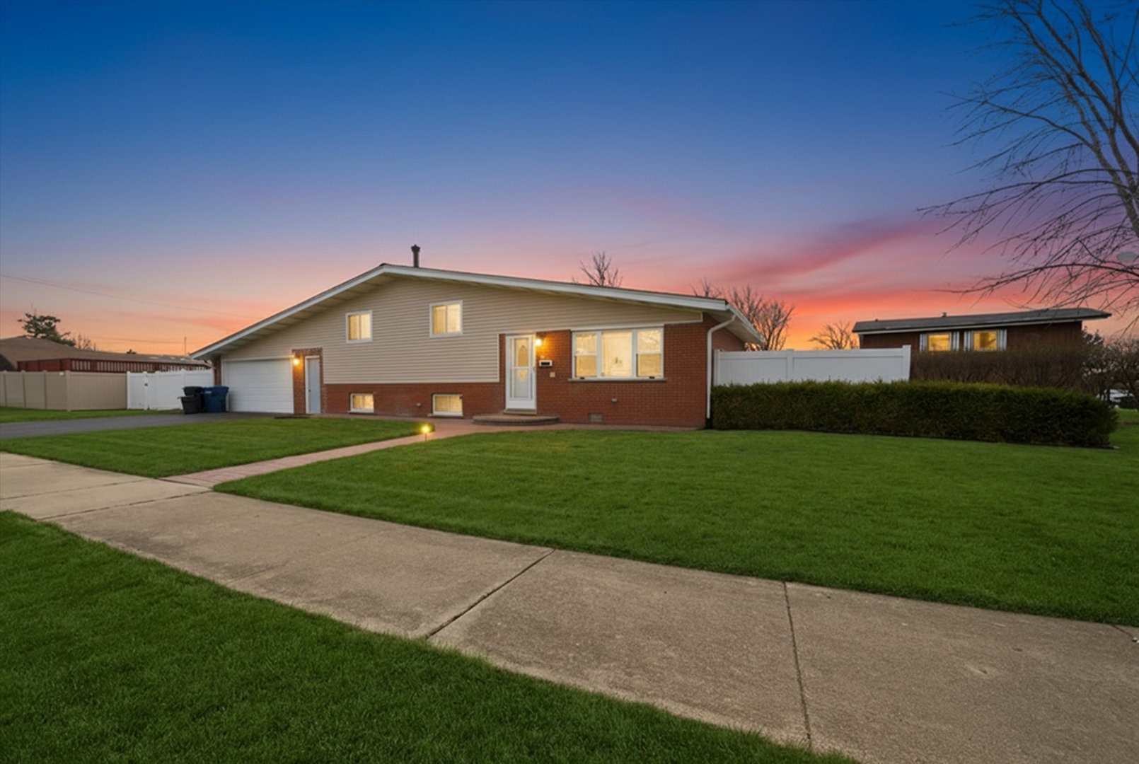 10725 Rutherford Avenue Worth, IL 60482 - Photo 2 of 44 a front view of house with yard and green space