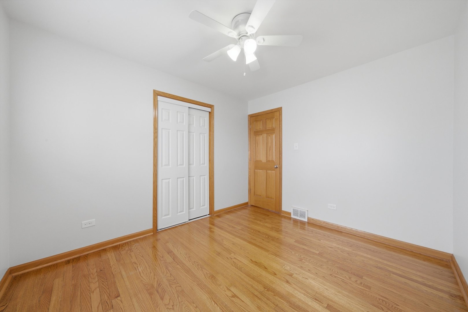 10725 Rutherford Avenue Worth, IL 60482 - Photo 22 of 44 wooden floor in an empty room