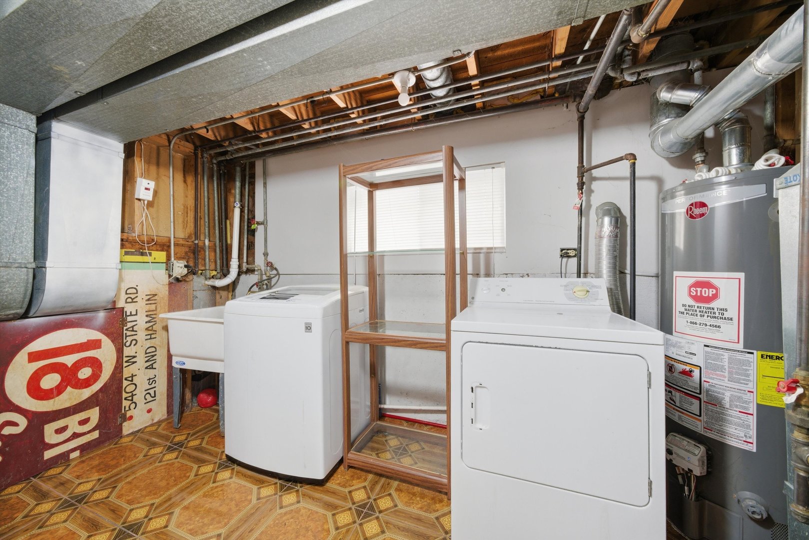 10725 Rutherford Avenue Worth, IL 60482 - Photo 37 of 44 a utility room with dryer and washer
