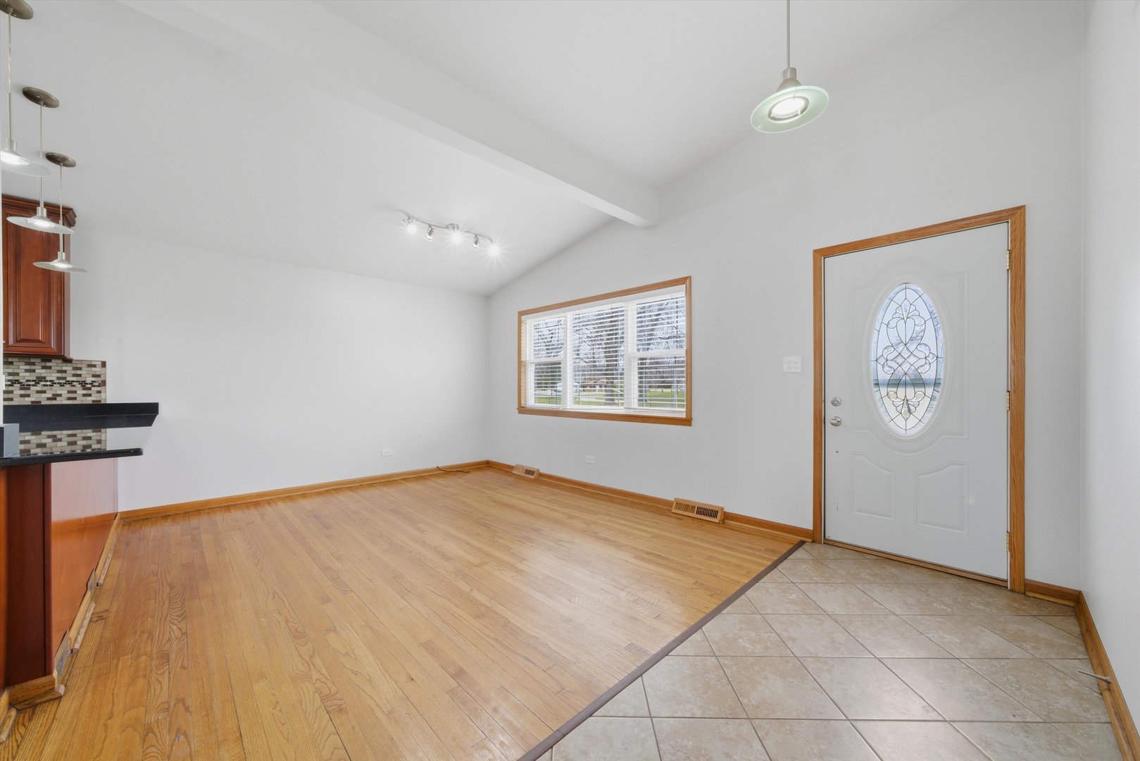 10725 Rutherford Avenue Worth, IL 60482 - Photo 9 of 44 a view of an empty room with a window