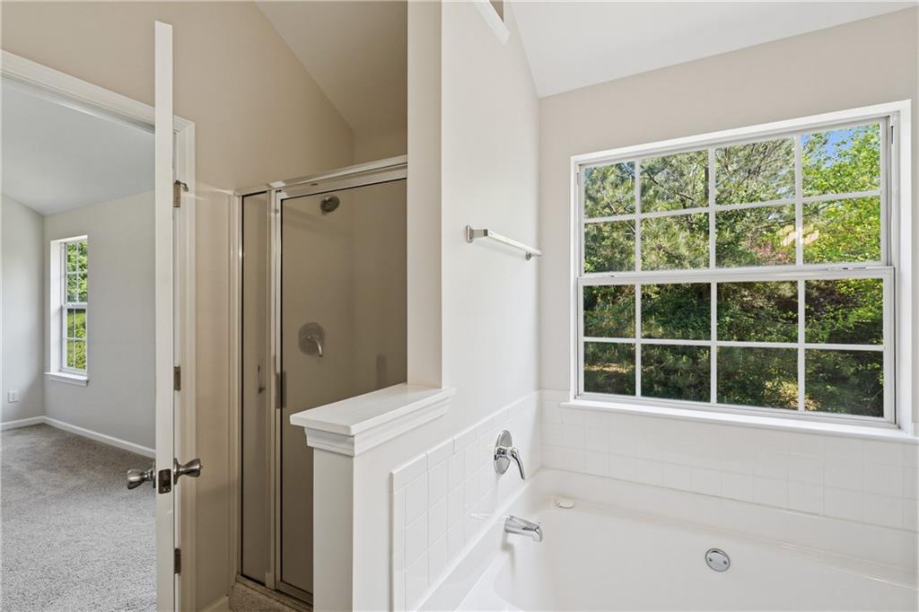 6065 Hemperly Road College Park, GA 30349 - Photo 14 of 18 a bathroom with a tub and a window