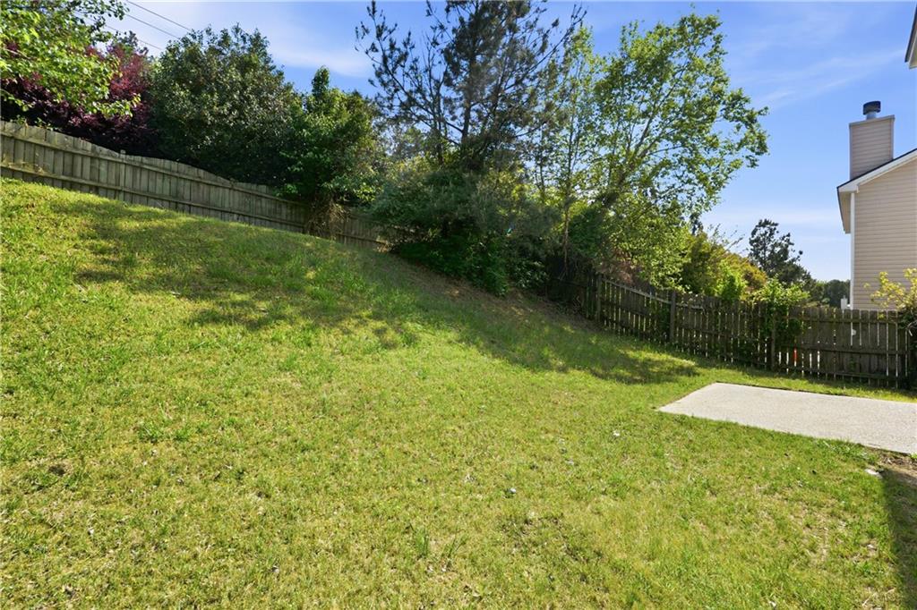 6065 Hemperly Road College Park, GA 30349 - Photo 18 of 18 a view of a backyard with green space