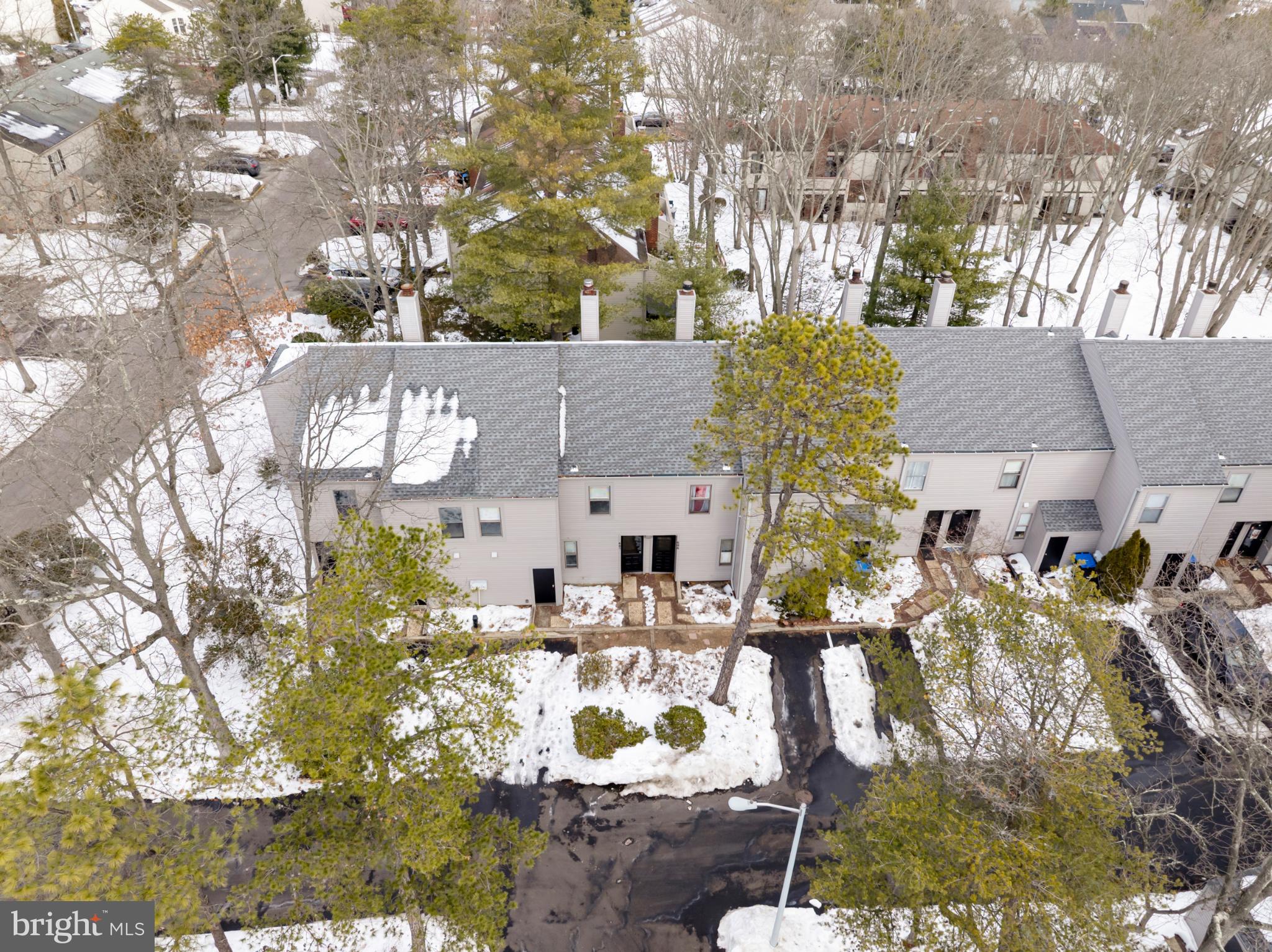607 Bromley Estate Pine Hill, NJ 08021 - Photo 15 of 21 Charming townhomes nestled in winter's embrace.