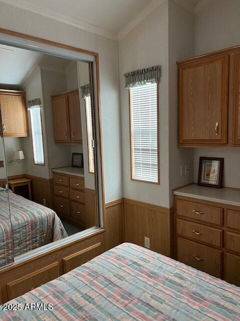 3710 South Goldfield Road Apache Junction, AZ 85119 - Photo 12 of 14 a bedroom with a bed and a dresser