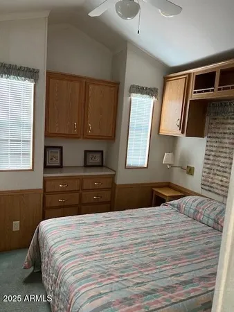 a bedroom with a bed and a closet