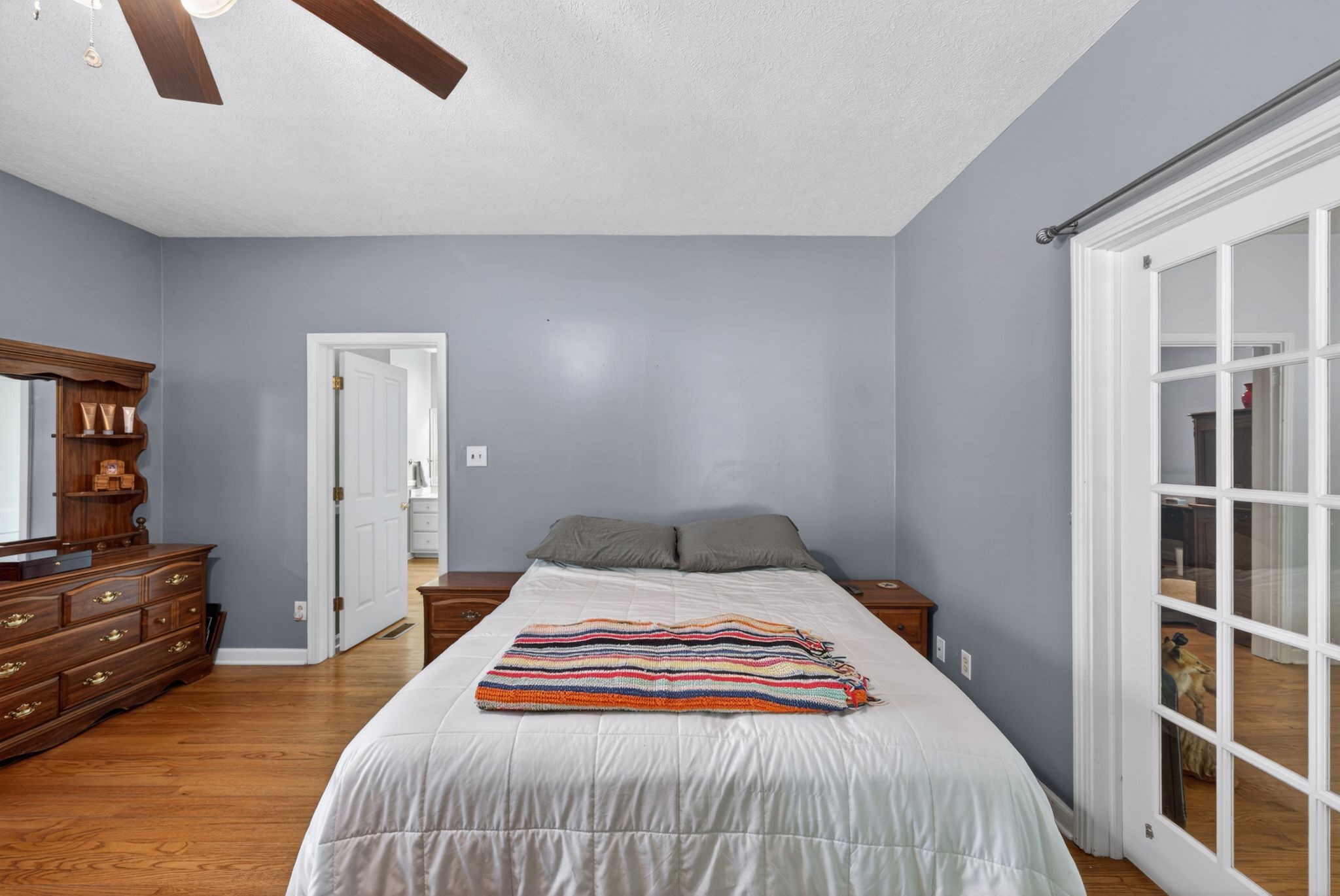 2149 Talley Road Belfast, TN 37019 - Photo 16 of 93 a bedroom with a bed and walk in closet with wooden floor