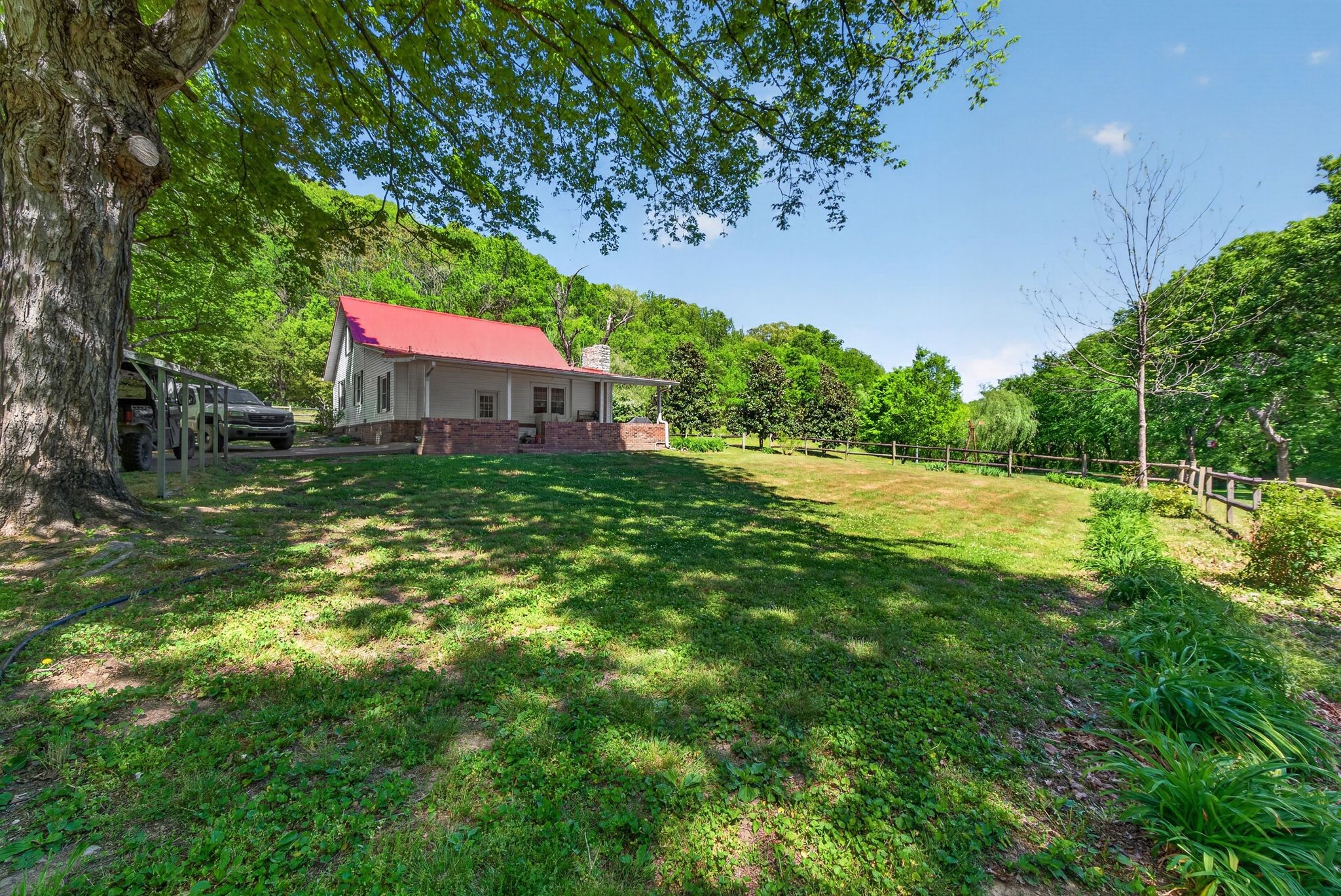 2149 Talley Road Belfast, TN 37019 - Photo 40 of 93 a backyard of a house with lots of green space