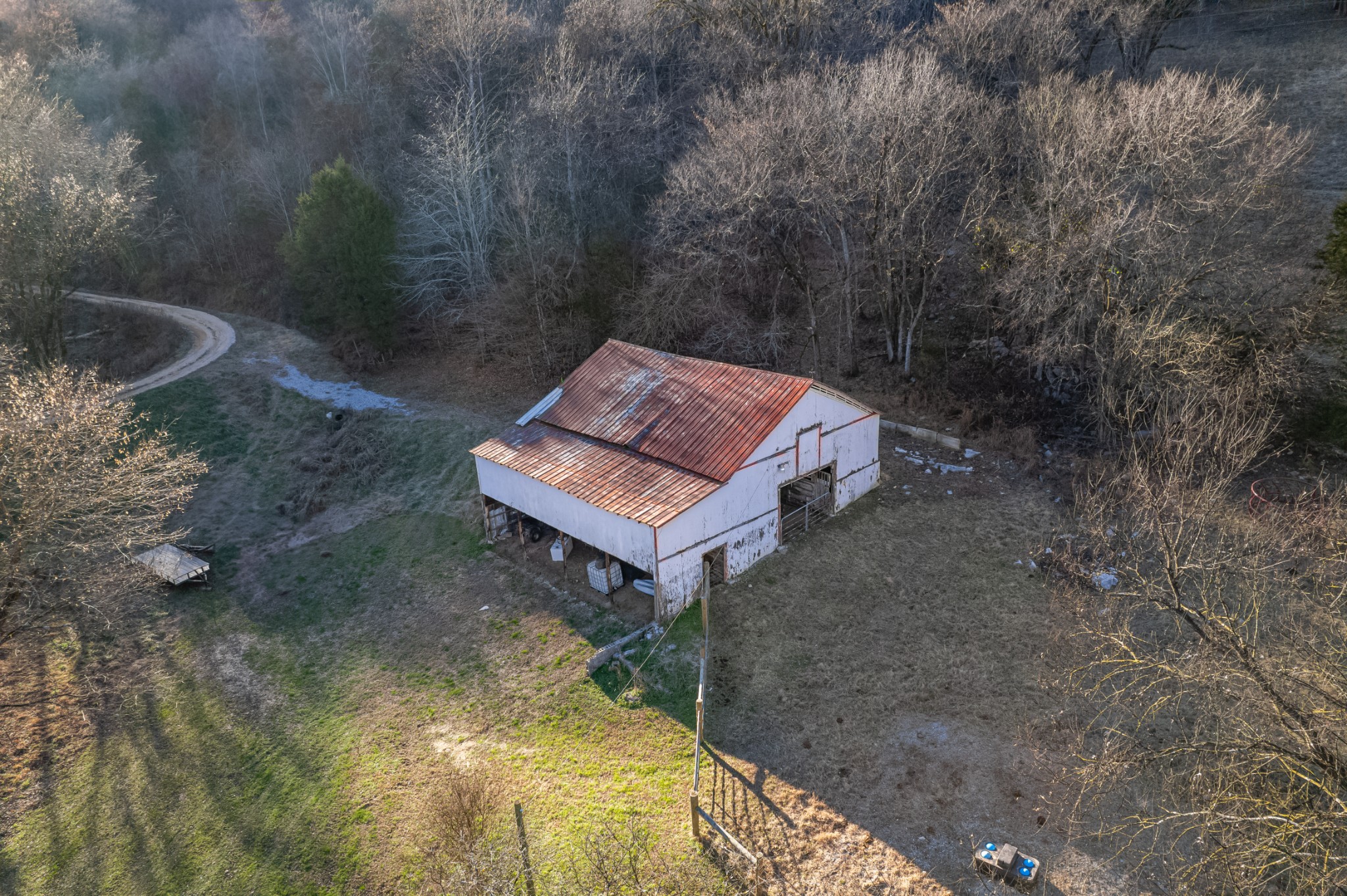 2149 Talley Road Belfast, TN 37019 - Photo 55 of 93 a view of a yard with a bench