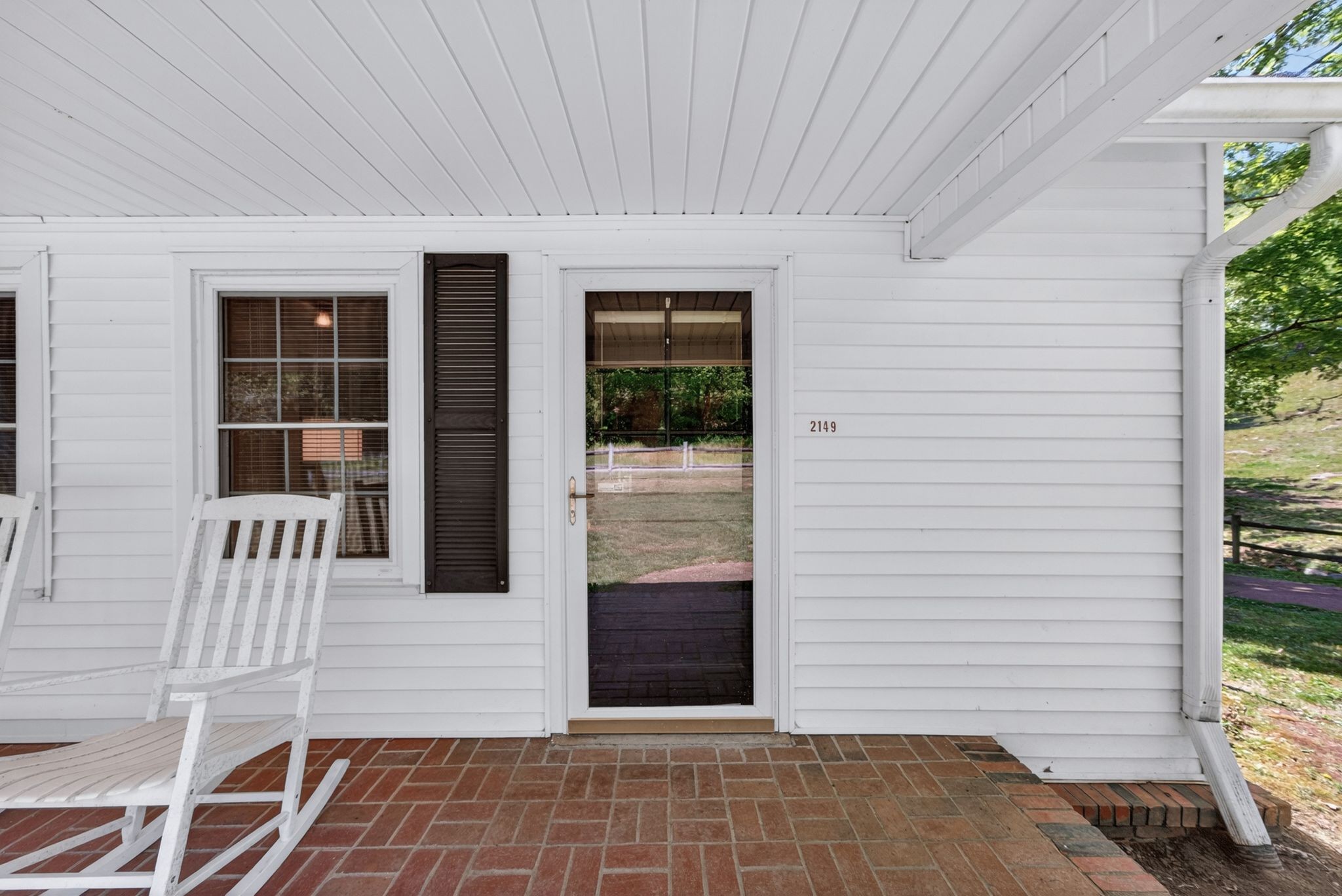 2149 Talley Road Belfast, TN 37019 - Photo 9 of 93 a view of a porch with a table and chair