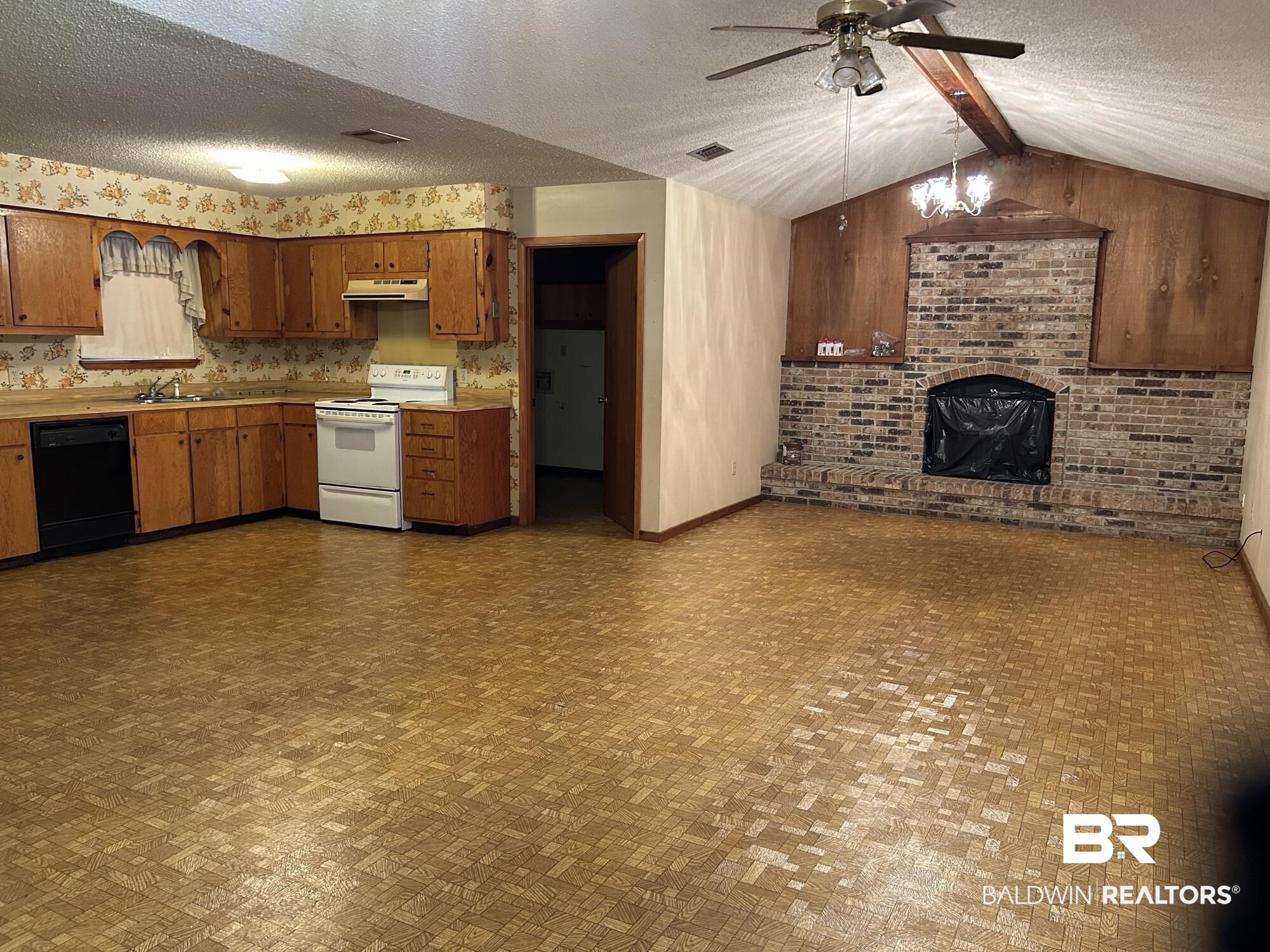1350 A Schillinger Road South Mobile, AL 36695 - Photo 2 of 18 Kitchen featuring white electric stove, dishwasher, under cabinet range hood, ceiling fan, and lofted ceiling