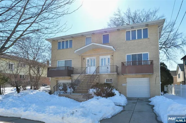 a view of a house with a patio