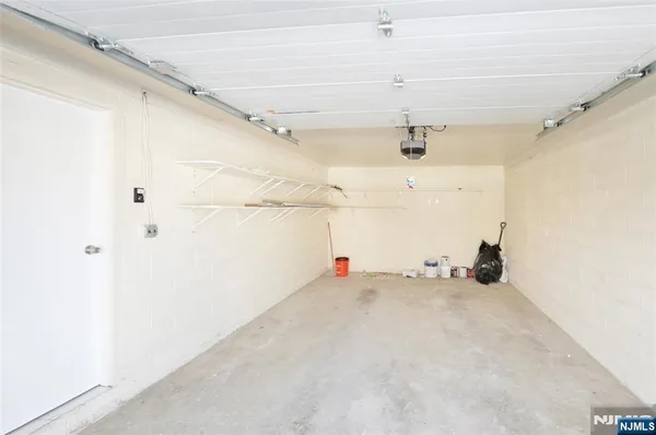 a view of a room with cabinet and air conditioner