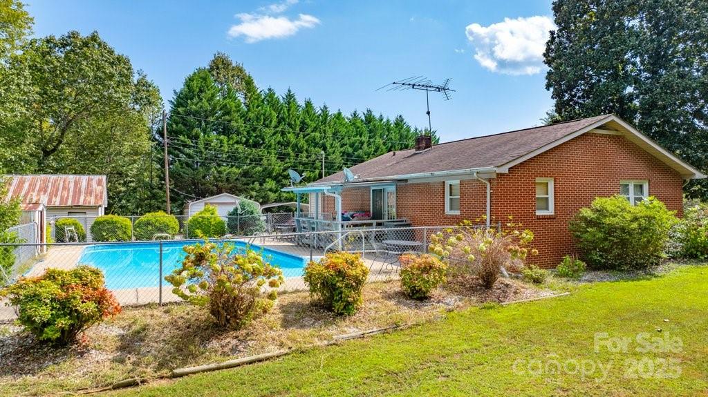 489 Ned Mcgimsey Road Nebo, NC 28761 - Photo 16 of 25 a front view of house with yard and green space