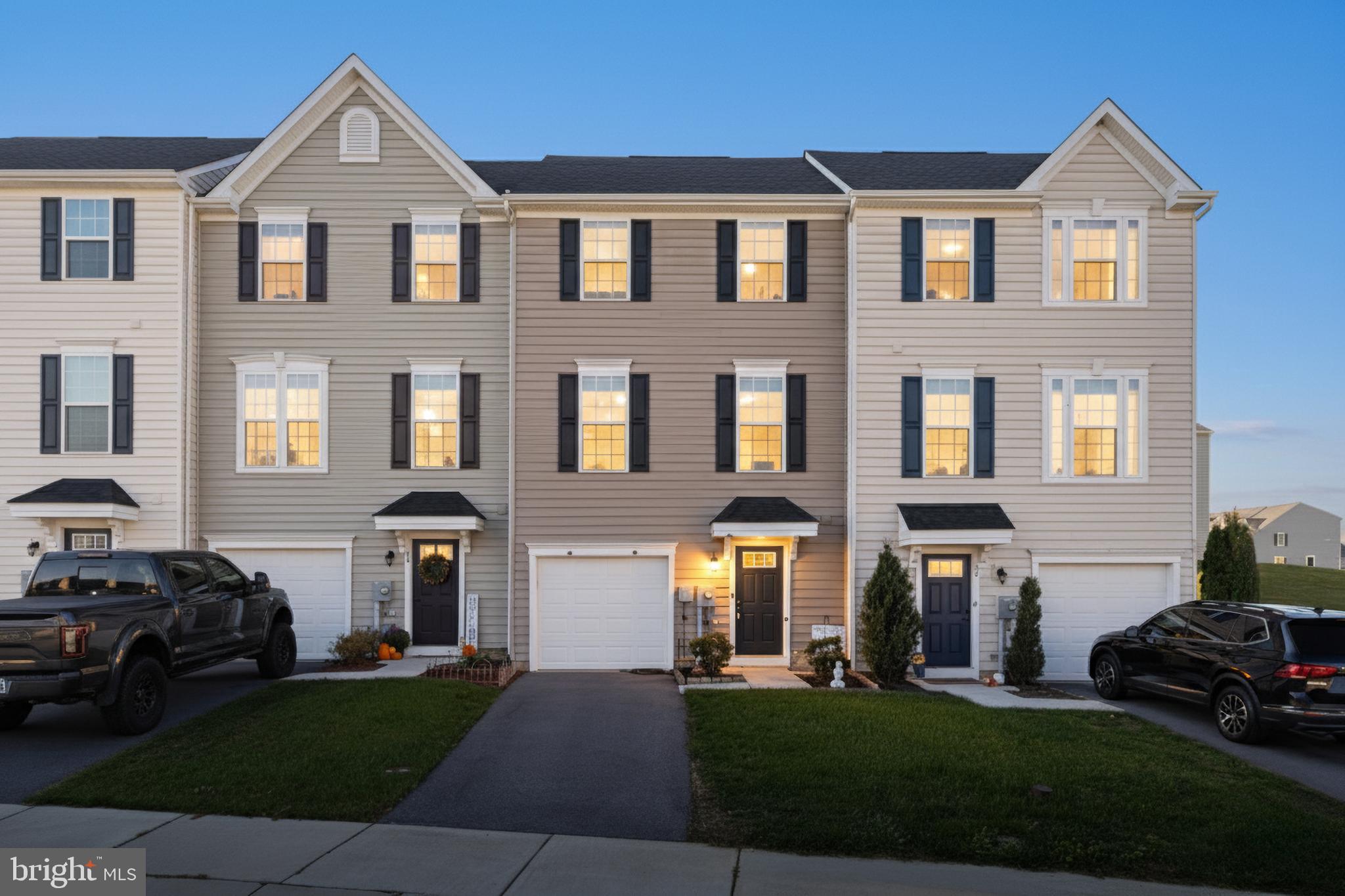 26 Quebec Court Falling Waters, WV 25419 - Photo 2 of 29 a front view of a house with a yard
