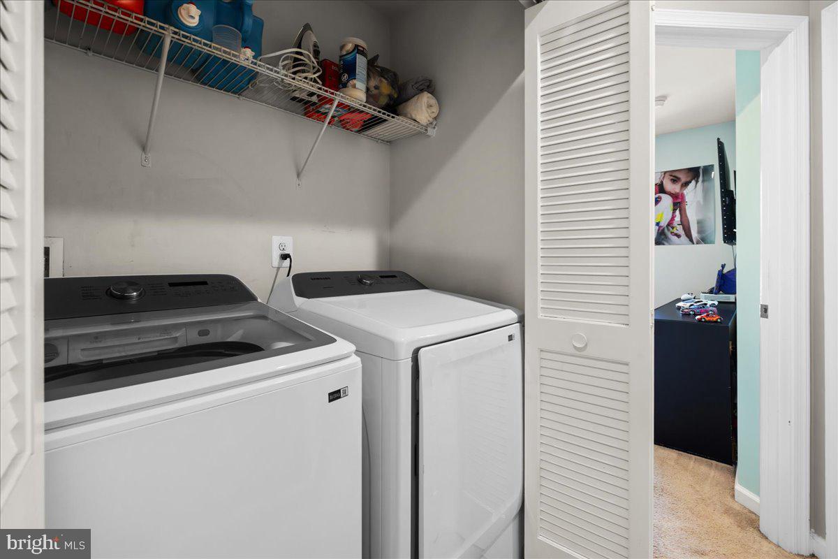26 Quebec Court Falling Waters, WV 25419 - Photo 22 of 29 a utility room with dryer and washer
