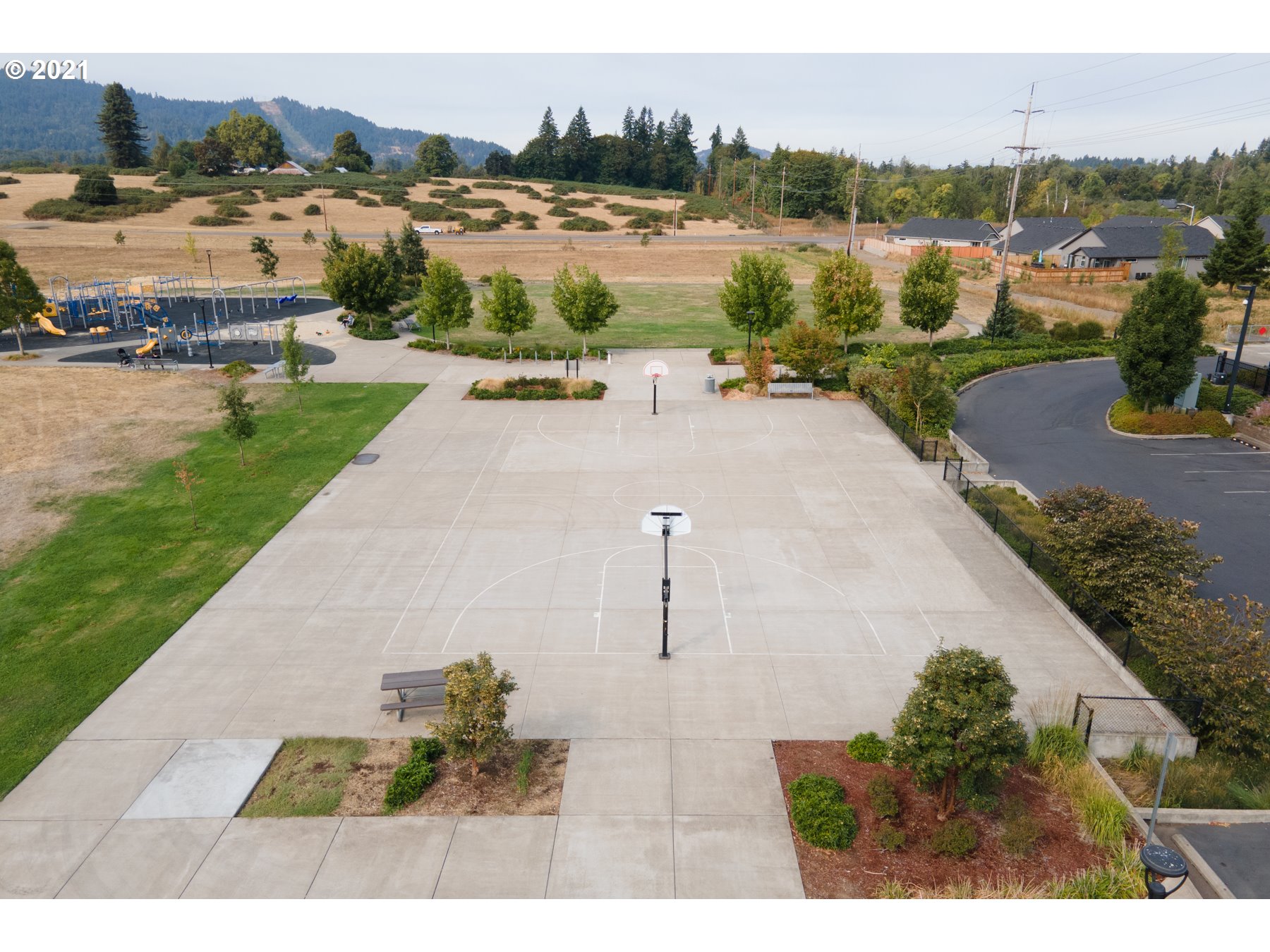 6046 Quartz Avenue Springfield, OR 97478 - Photo 22 of 22 a view of a lake with a yard and lake view