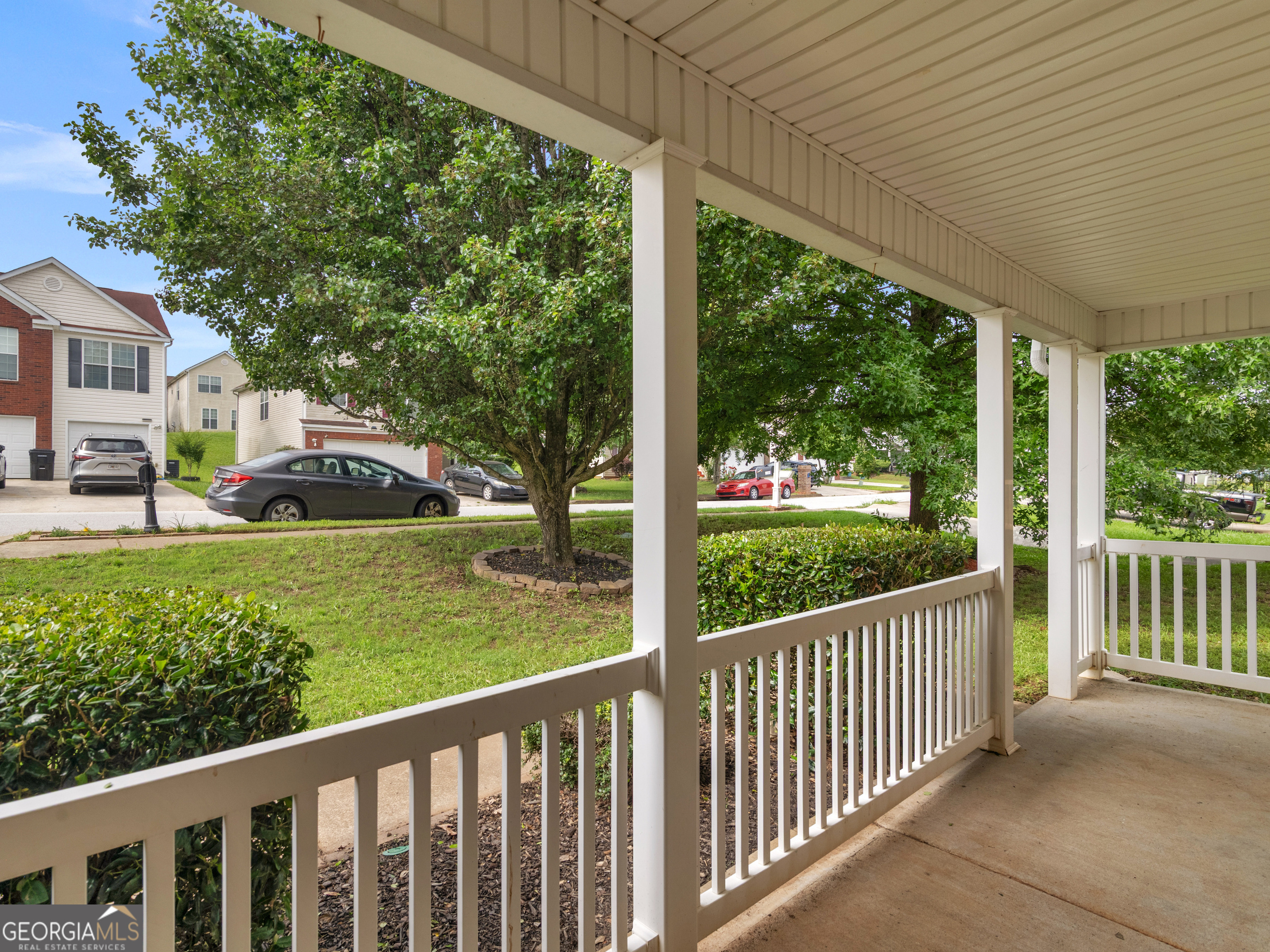 3370 Waggoner Place Rex, GA 30273 - Photo 3 of 25 a view of a wooden deck and a yard