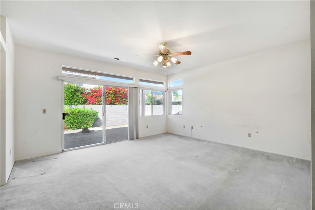 69860 Mccallum Way Cathedral City, CA 92234 - Photo 14 of 25 a view of an empty room with a window