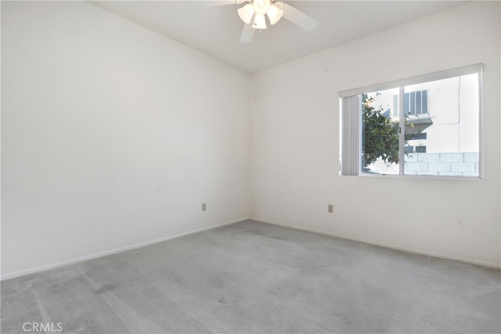 69860 Mccallum Way Cathedral City, CA 92234 - Photo 21 of 25 an empty room with a window