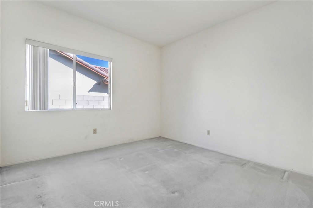 69860 Mccallum Way Cathedral City, CA 92234 - Photo 22 of 25 an empty room with a window