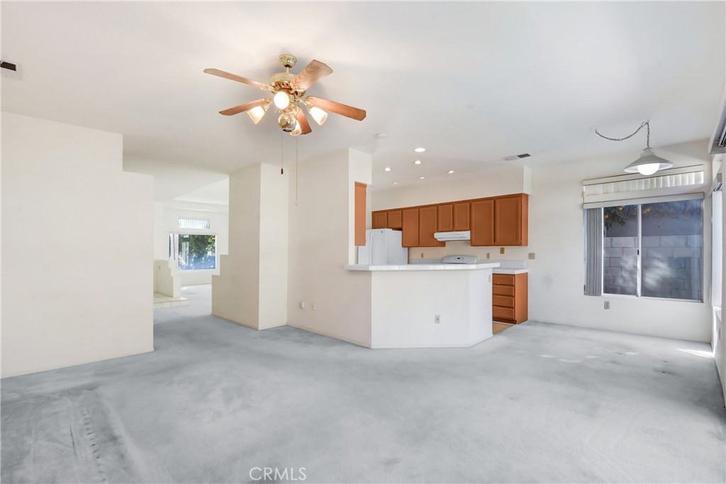 69860 Mccallum Way Cathedral City, CA 92234 - Photo 7 of 25 a view of a livingroom with a kitchen