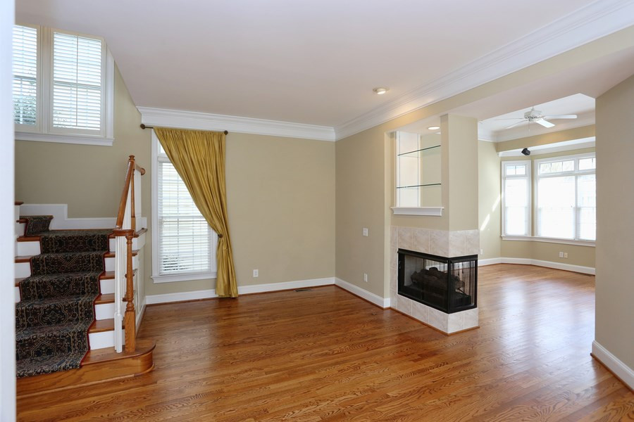 3109 Bentley Hill Road Raleigh, NC 27612 - Photo 6 of 25 This living room is just the right size for a small seating area to read and relax by the fire. Its openness to the dining room gives it a formal appeal. Living Room