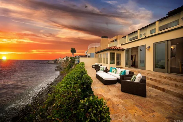 a front view of a house with a garage