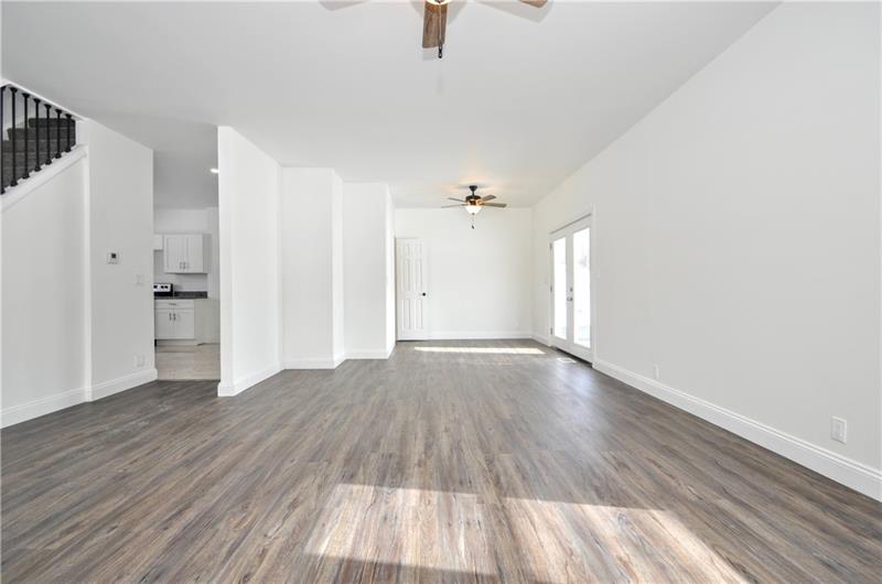 61 Bethel Ridge Road Avella, PA 15312 - Photo 11 of 28 a view of an empty room with wooden floor and a window