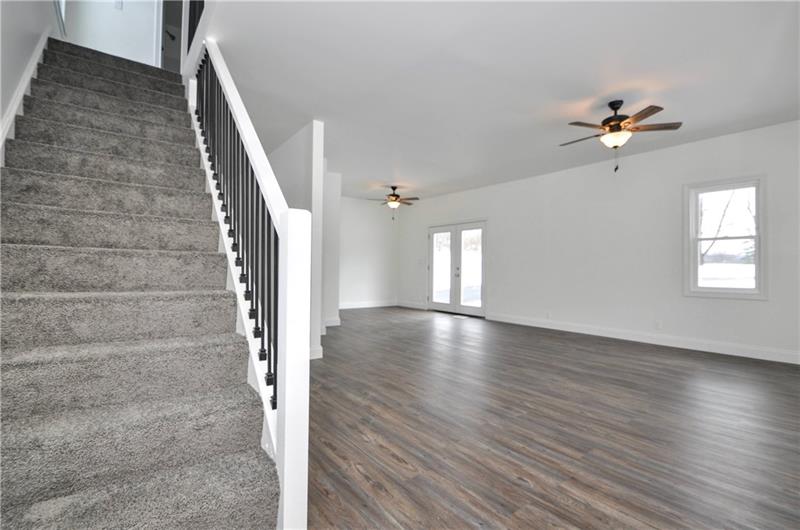 61 Bethel Ridge Road Avella, PA 15312 - Photo 16 of 28 wooden floor in an empty room with a window