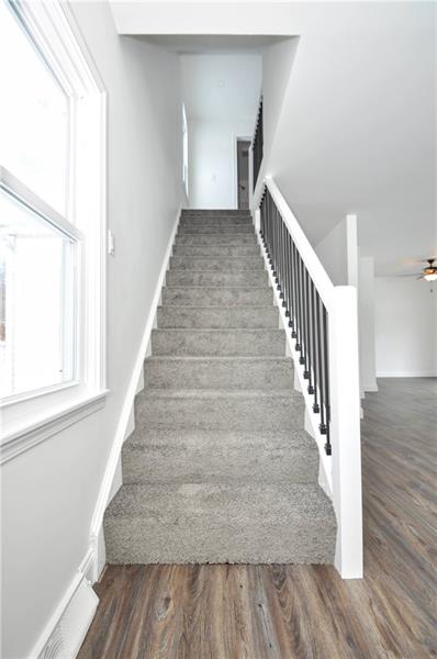 61 Bethel Ridge Road Avella, PA 15312 - Photo 17 of 28 a view of entryway and hall with wooden floor