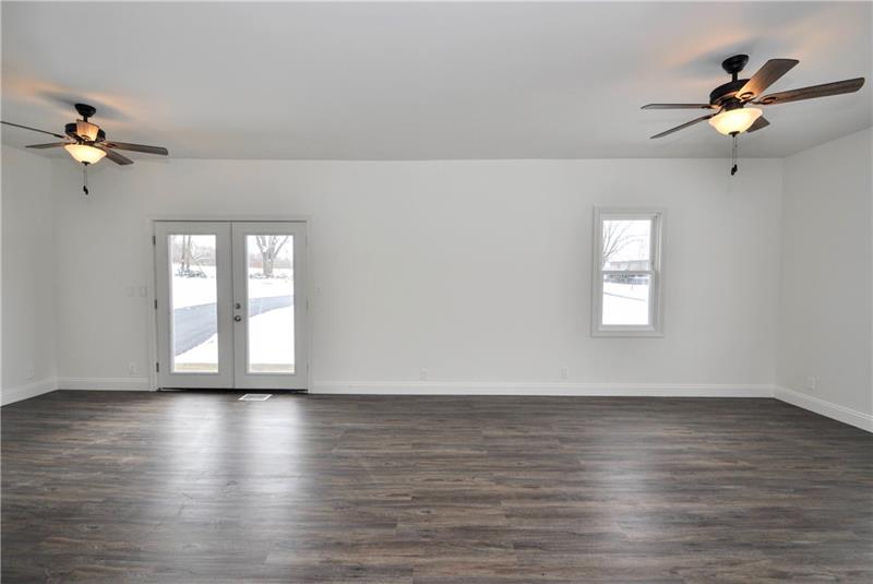 61 Bethel Ridge Road Avella, PA 15312 - Photo 28 of 28 a view of an empty room with a window and wooden floor