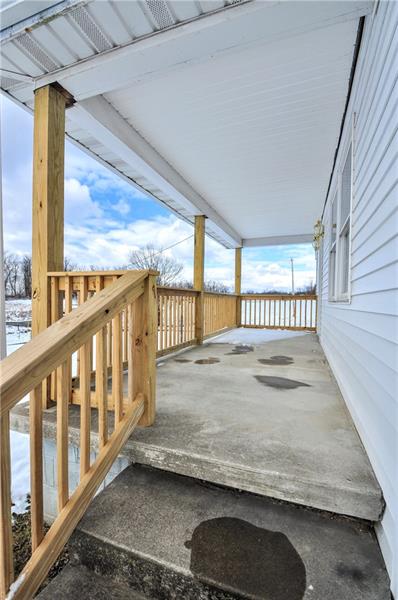 61 Bethel Ridge Road Avella, PA 15312 - Photo 5 of 28 a view of a porch with wooden floor