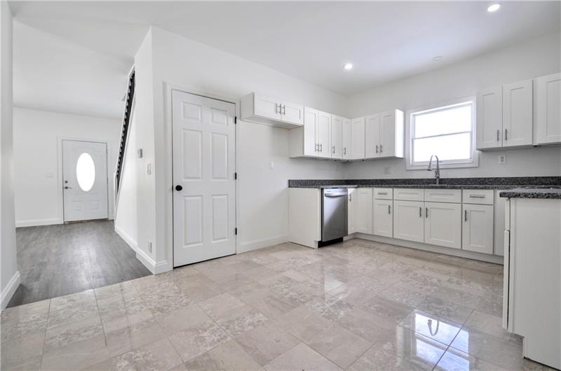 61 Bethel Ridge Road Avella, PA 15312 - Photo 7 of 28 a kitchen with white cabinets and sink