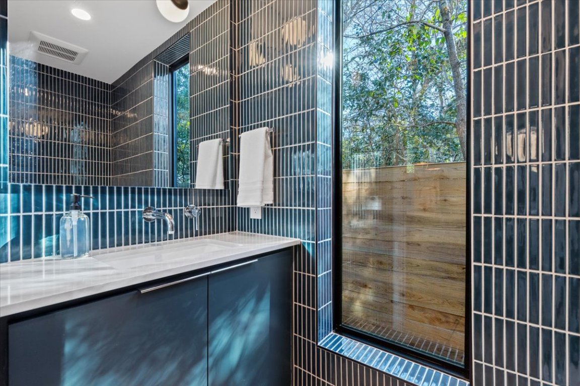 1709 Willow Street, Unit 2 Austin, TX 78702 - Photo 17 of 20 a view of balcony and wooden floor