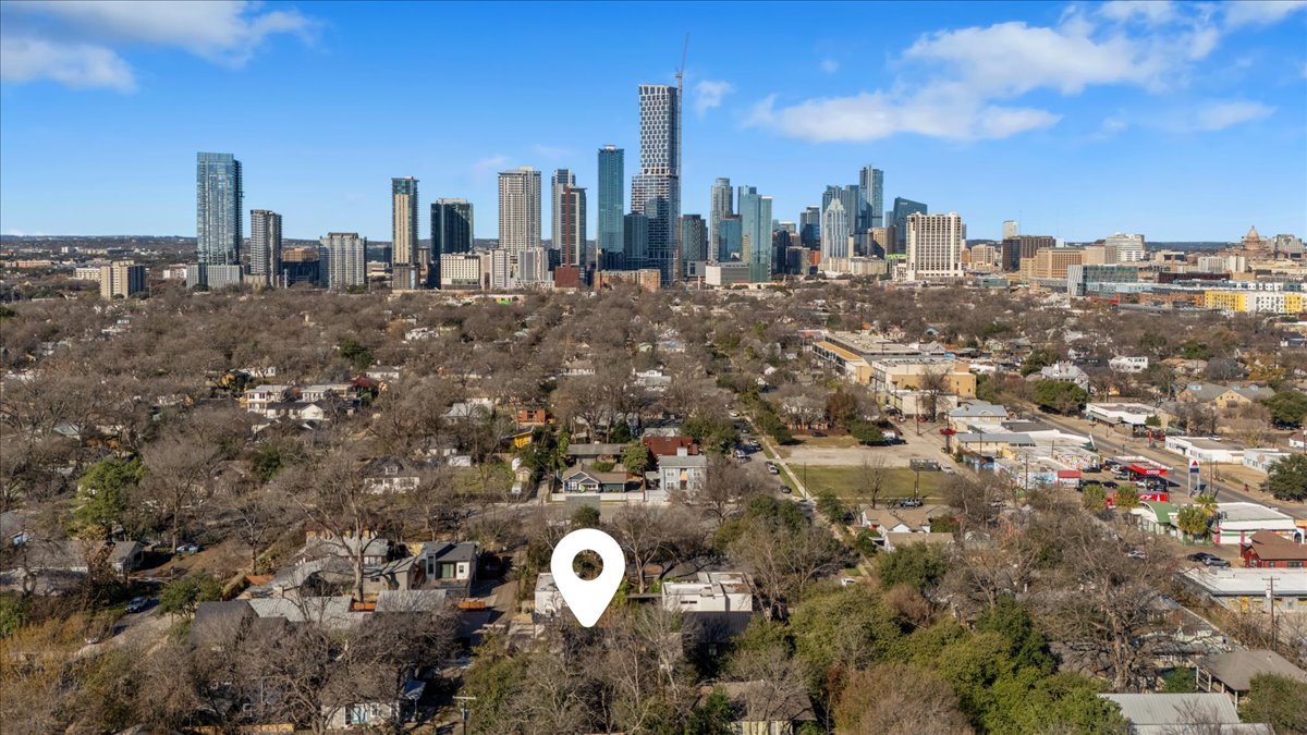 1709 Willow Street, Unit 2 Austin, TX 78702 - Photo 2 of 20 a view of a city with tall buildings
