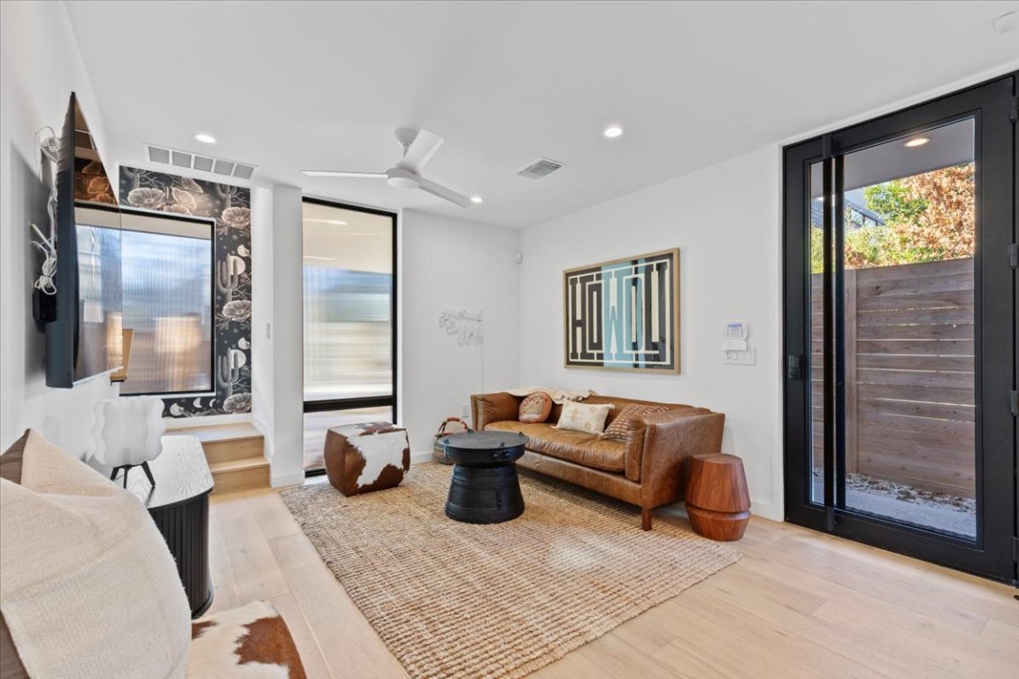1709 Willow Street, Unit 2 Austin, TX 78702 - Photo 4 of 20 a living room with furniture and a flat screen tv