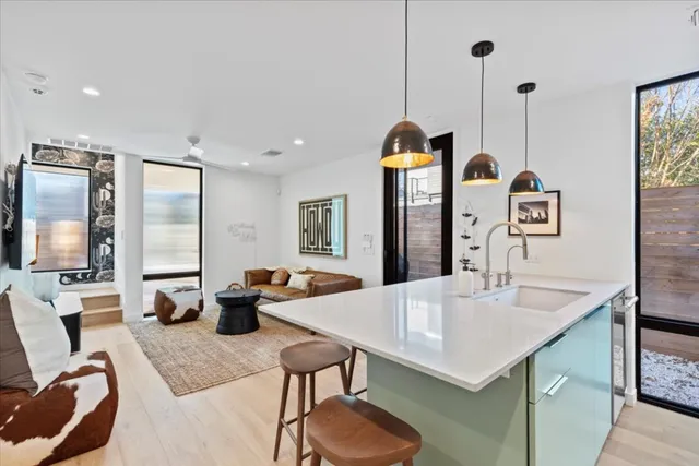 a very nice looking dining room with a table and chairs