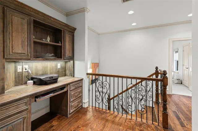a kitchen with granite countertop a stove and a microwave