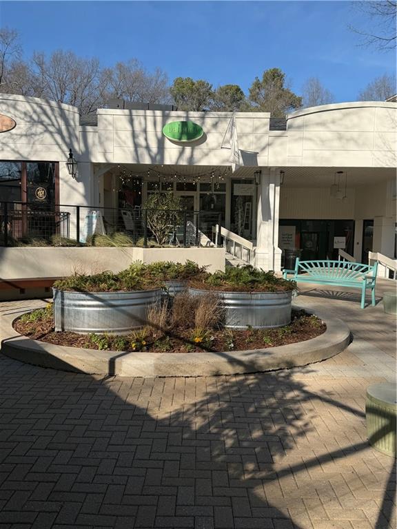 11 Perimeter Centre East, Unit 1112 Atlanta, GA 30346 - Photo 37 of 38 a view of a house with a swimming pool