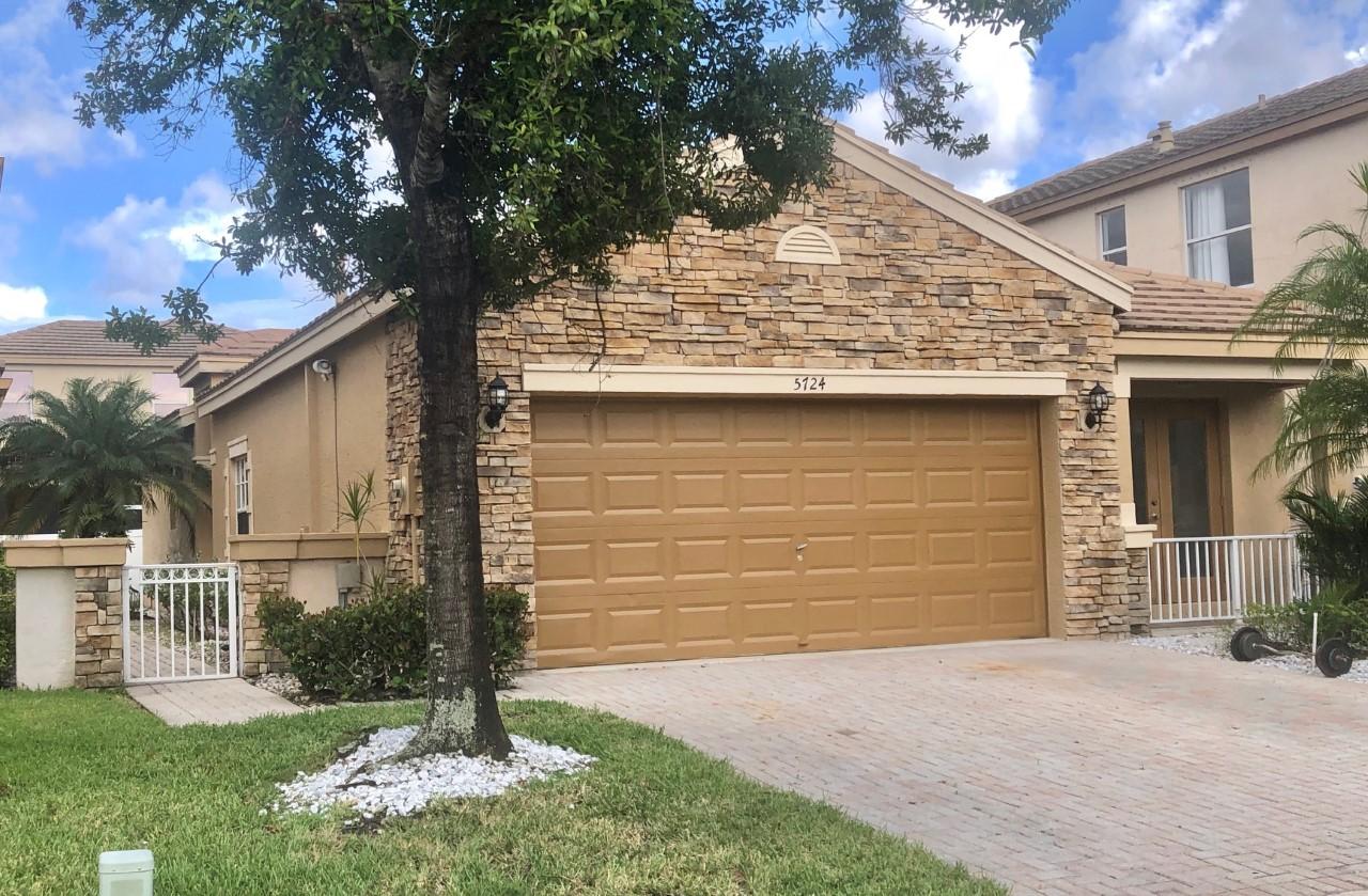 5724 Raceway Road Lake Worth, FL 33449 - Photo 1 of 35 front