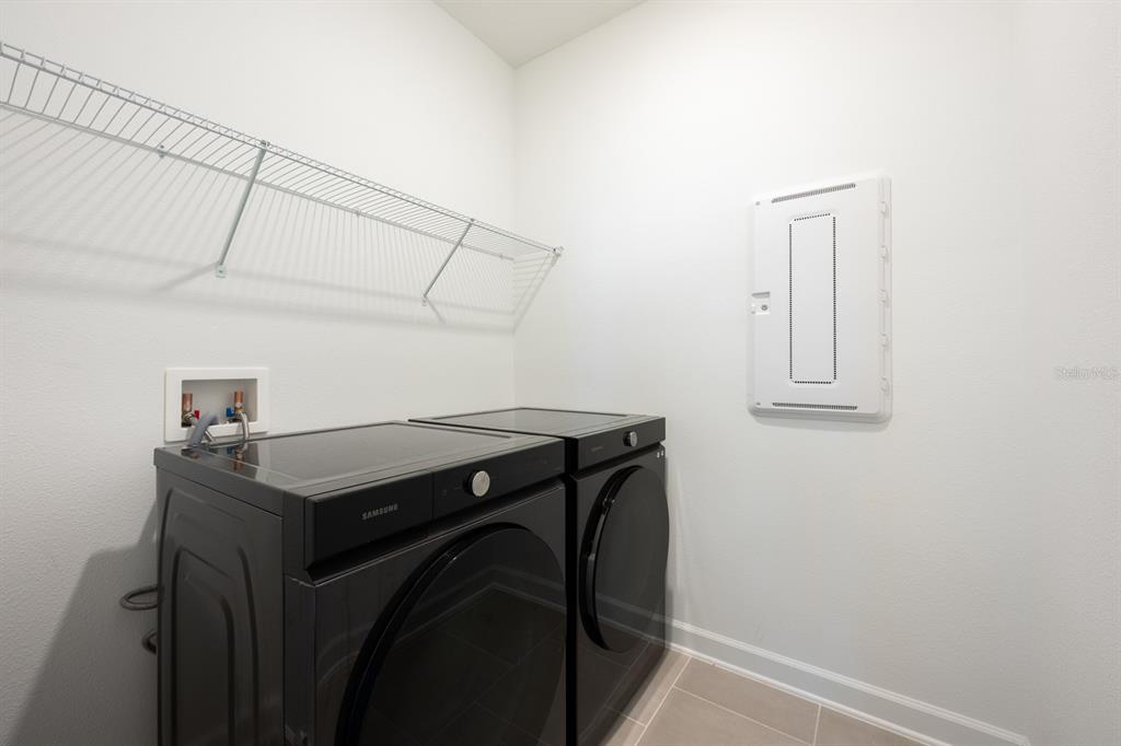 1874 Flourish Avenue Kissimmee, FL 34744 - Photo 20 of 35 a utility room with dryer and washer