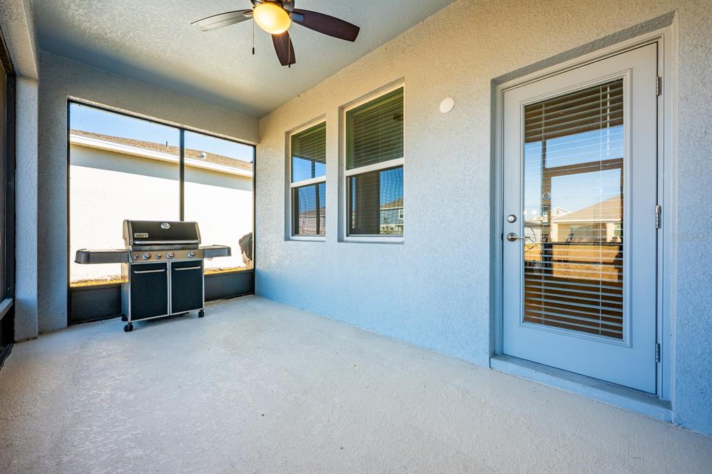 1874 Flourish Avenue Kissimmee, FL 34744 - Photo 21 of 35 a view of a livingroom with furniture and a window
