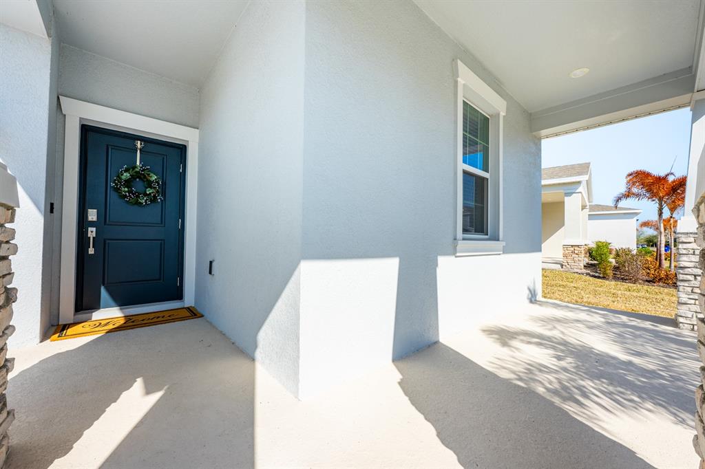 1874 Flourish Avenue Kissimmee, FL 34744 - Photo 23 of 35 a view of living room with furniture and front door