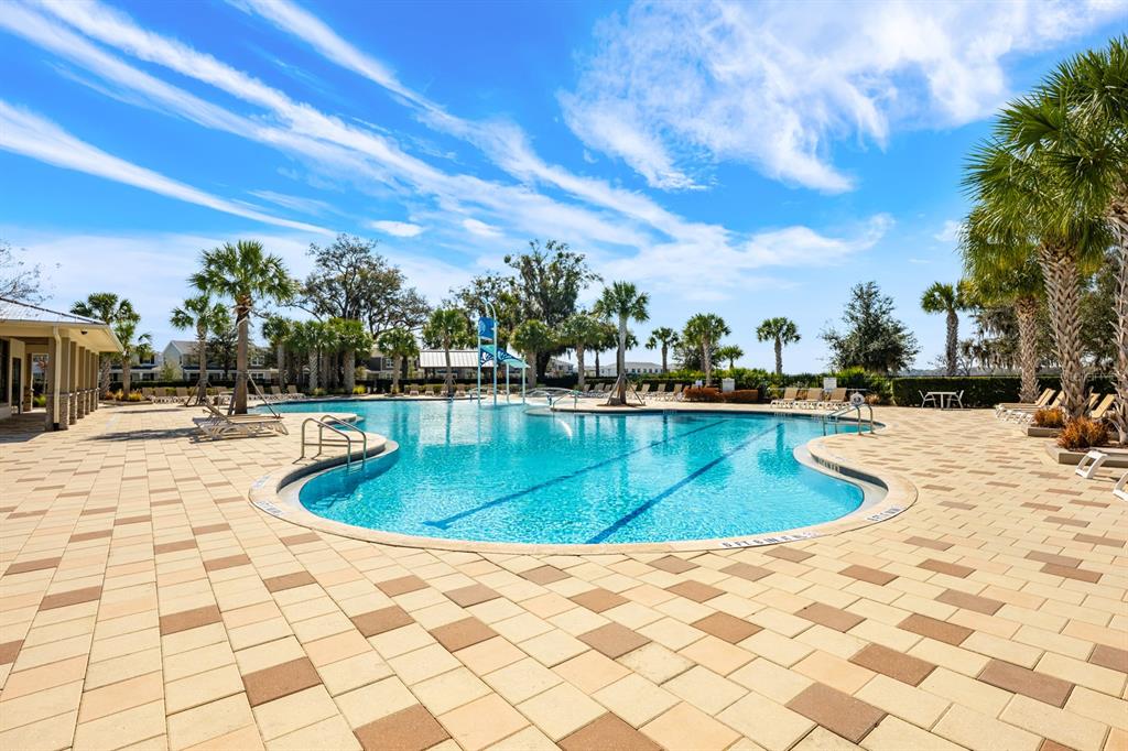 1874 Flourish Avenue Kissimmee, FL 34744 - Photo 25 of 35 a view of a swimming pool with a patio
