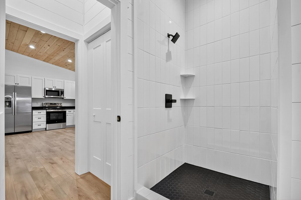 85 Duck Cove Morganton, GA 30560 - Photo 20 of 36 a bathroom with a sink and a washing machine